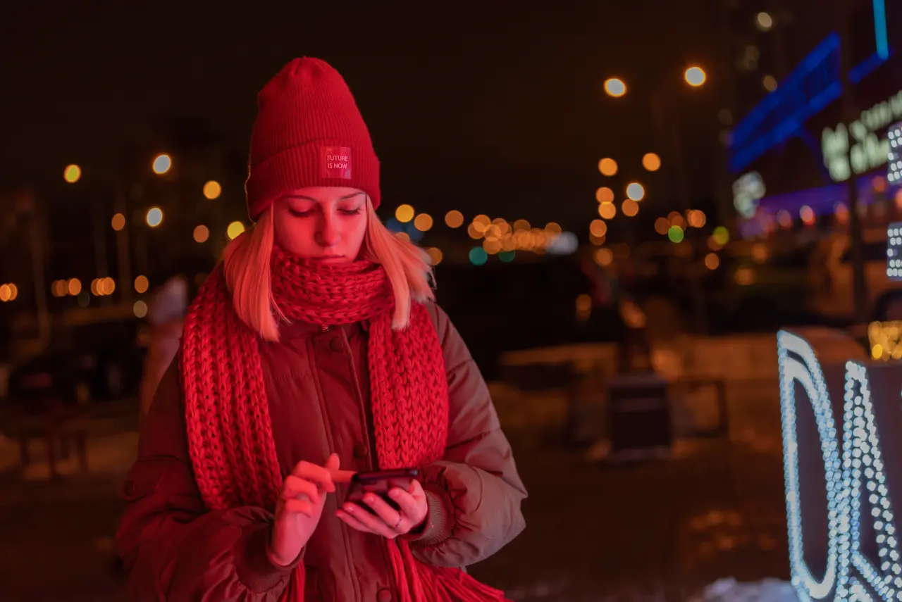 girl on phone at night