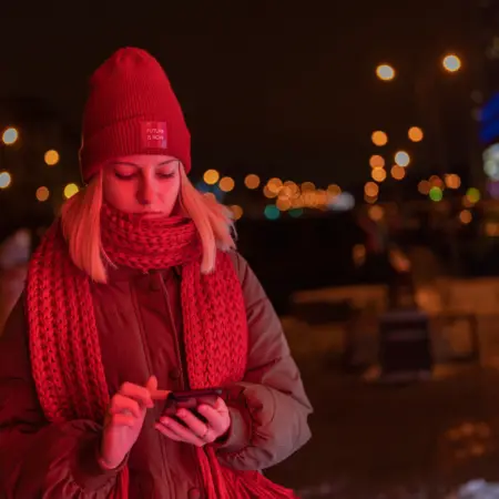 girl on phone at night